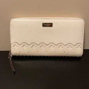 Kate Spade cream perforated floral wallet